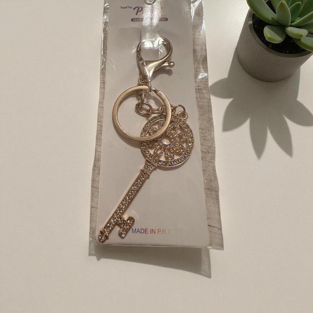 Goldtone Key Shaped Keychain with Rhinestone Detailing
